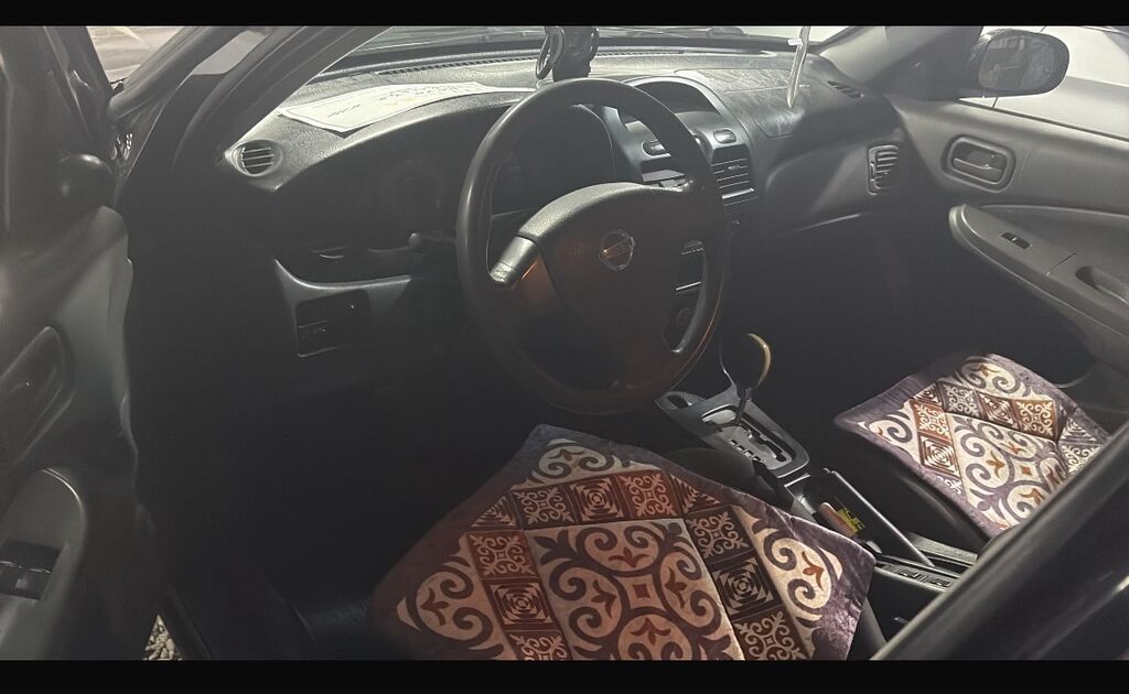 Nissan Almera: 2009 г., 1.8 л, Автомат, Бензин, Седан: фото 6