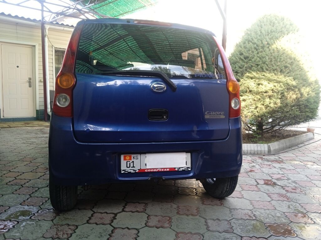 Daihatsu Cuore: 2009 г., 1 л, Механика: фото 4