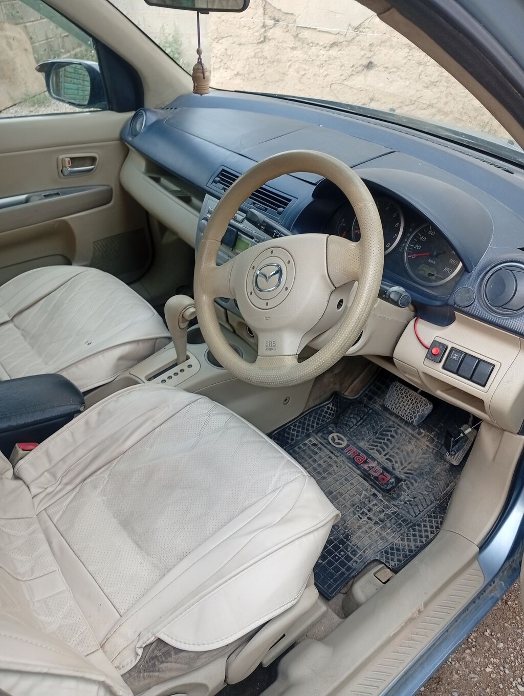 Mazda Demio: 2004 г., 1.3 л, Автомат, Бензин, Хэтчбэк: фото 5