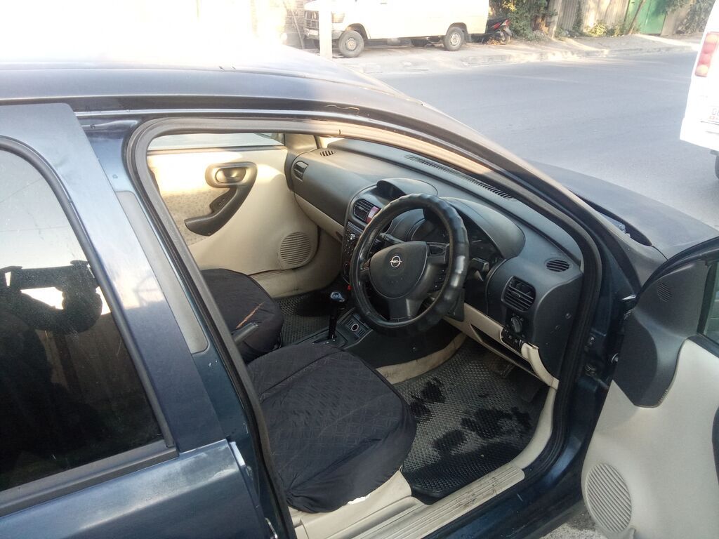 Opel Vita: 2001 г., 1.4 л: фото 5