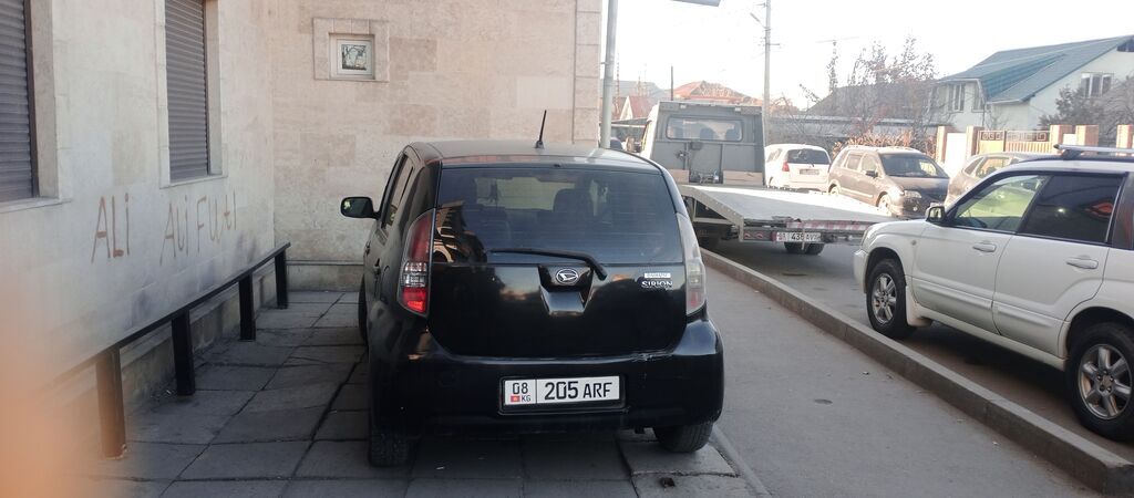 Daihatsu Sirion: 2010 г., Автомат, Бензин, Хэтчбэк: фото 5