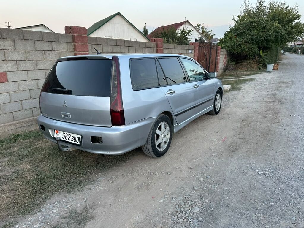 Mitsubishi Lancer: 2003 г., 1.6 л, Механика, Бензин, Универсал: фото 3