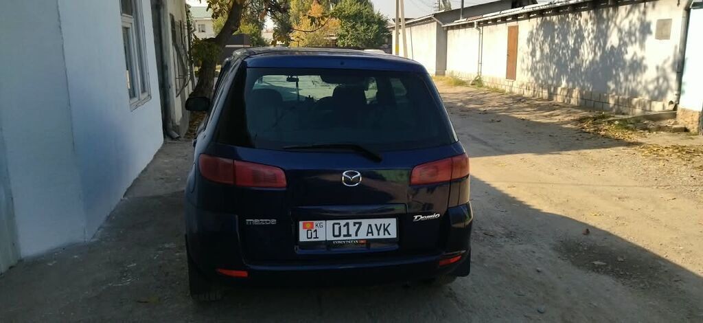 Mazda Demio: 2003 г., 1.3 л, Автомат: фото 5