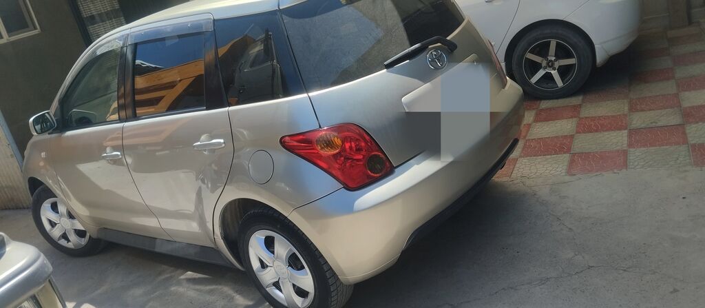 Toyota Ist: 2002 г., 1.5 л: фото 2
