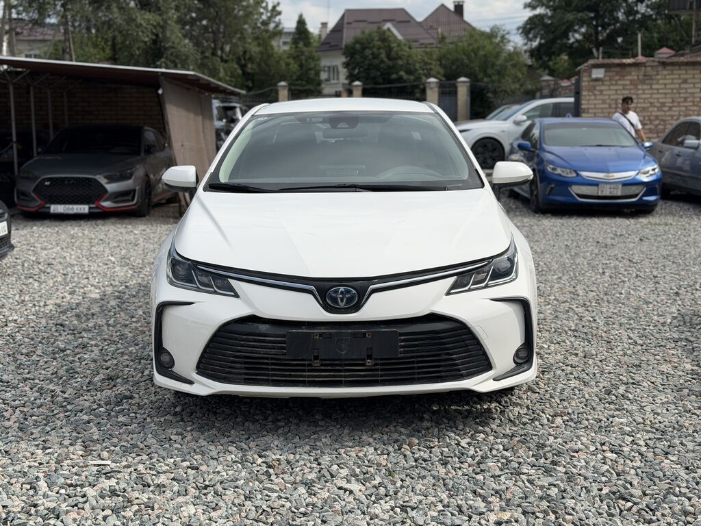 Toyota Corolla: 2022 г., 1.8 л, Вариатор, Гибрид, Седан: фото 2
