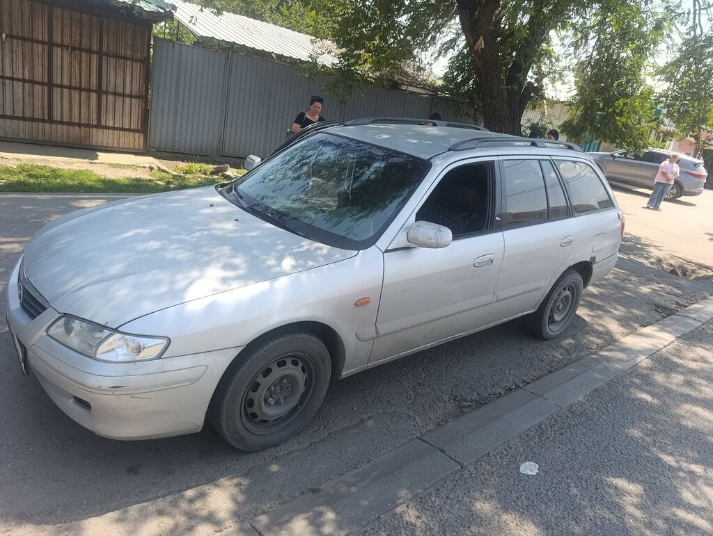 Mazda Capella 2001 г., универсал, 2.0 л, механика: фото 4
