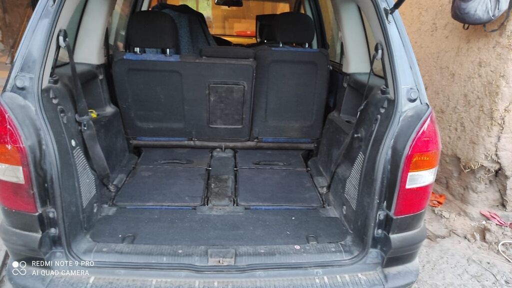 Opel Zafira: 2002 г., 1.8 л, Механика, Бензин, Минивэн — фото 8