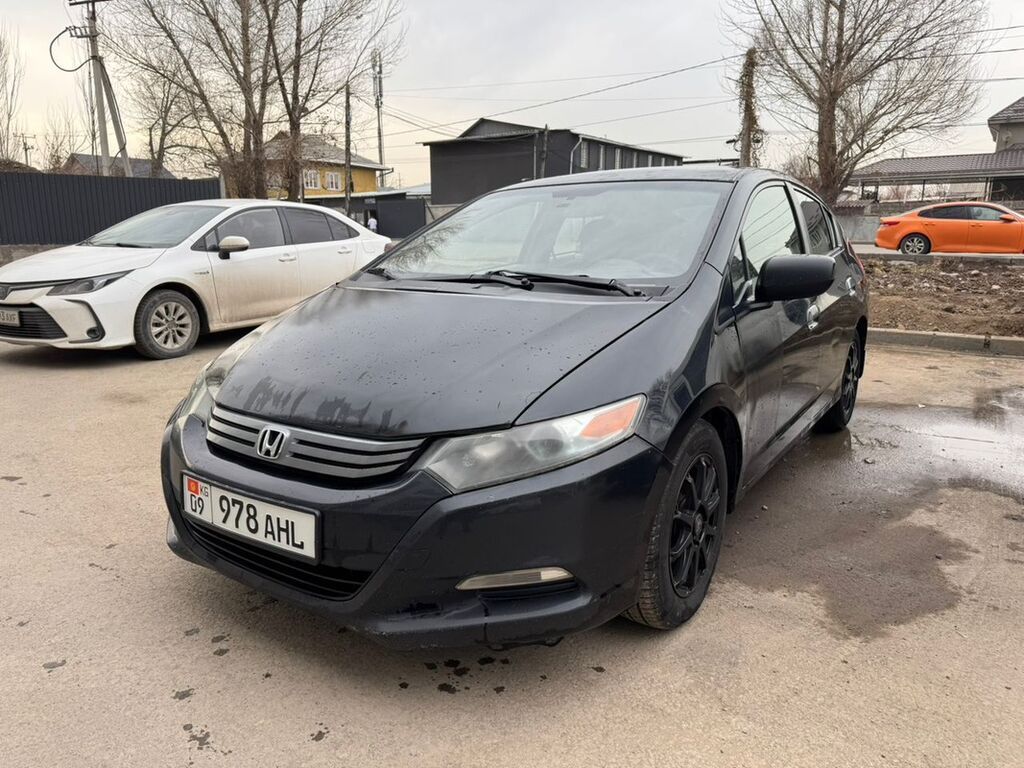 Honda Insight: 2010 г., 1.3 л, Вариатор, Гибрид, Хэтчбэк: фото 6