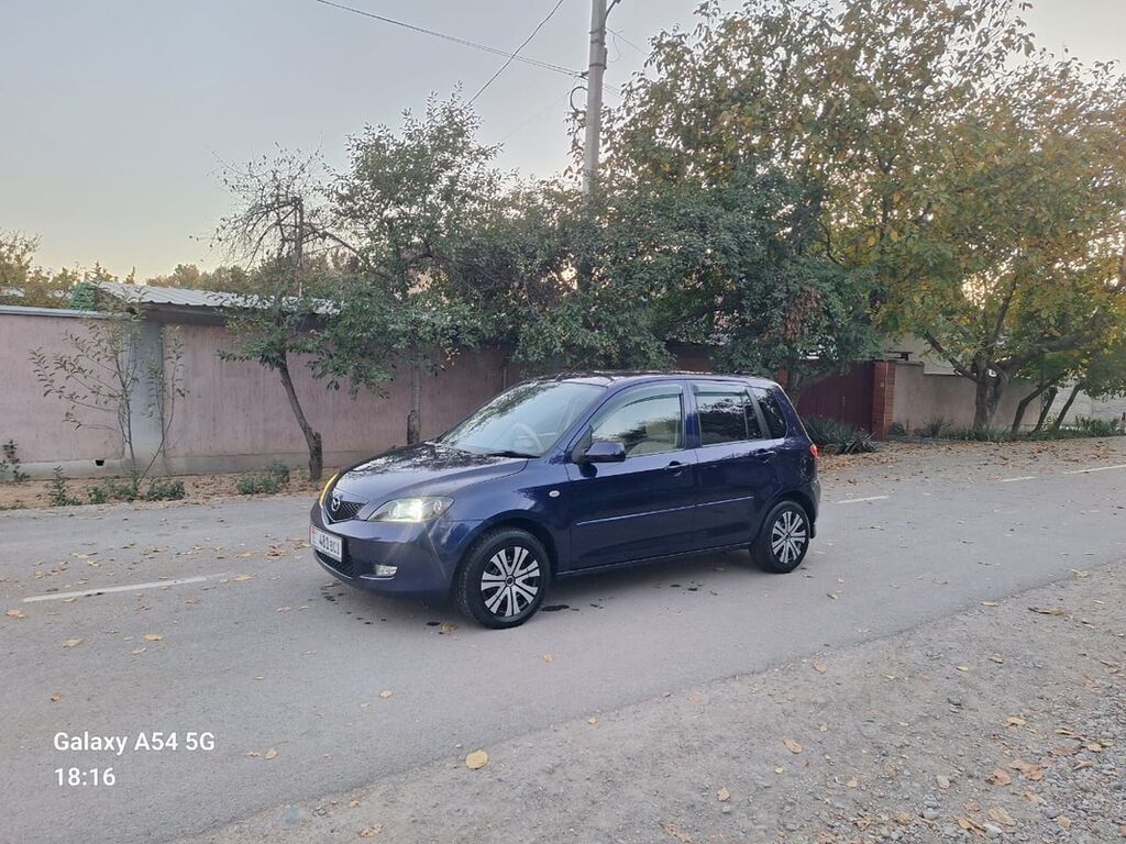 Mazda Demio: 2003 г., 1.3 л, Автомат, Бензин, Хэтчбэк: фото 2