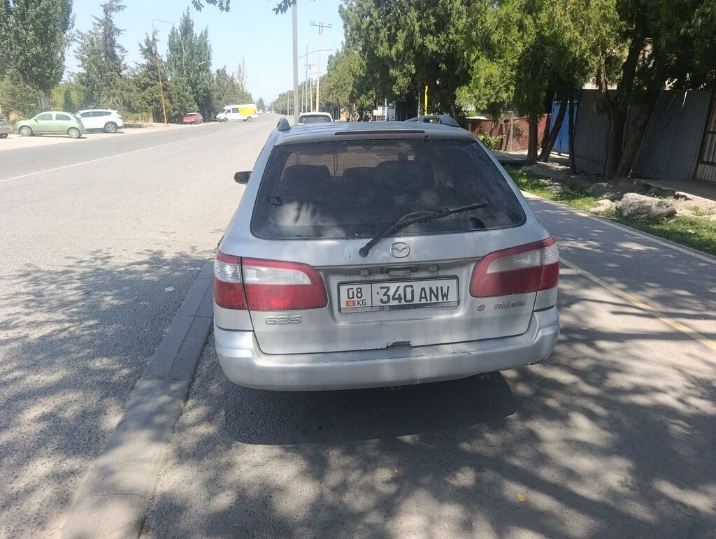 Mazda Capella 2001 г., универсал, 2.0 л, механика: фото 7
