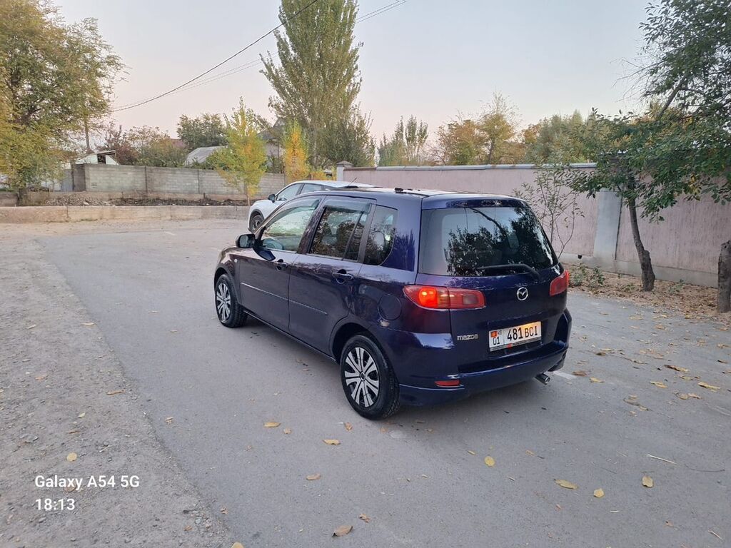 Mazda Demio: 2003 г., 1.3 л, Автомат, Бензин, Хэтчбэк: фото 5
