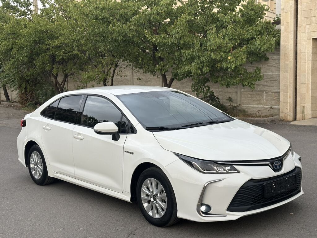 Toyota Corolla: 2023 г., 1.8 л, Автомат, Гибрид, Седан: фото 3