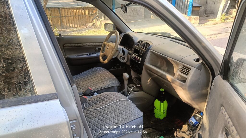 Mazda Demio: 2000 г., 1.5 л, Механика, Бензин, Хэтчбэк: фото 7