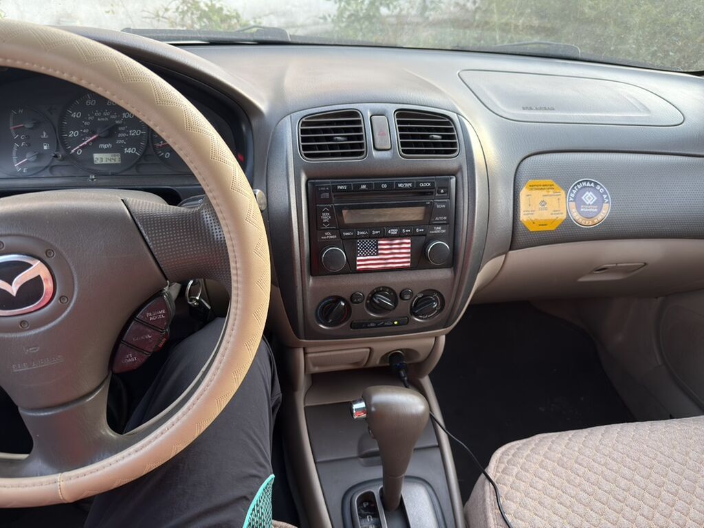 Mazda Protege: 2002 г., 1.6 л, Автомат, Седан: фото 7