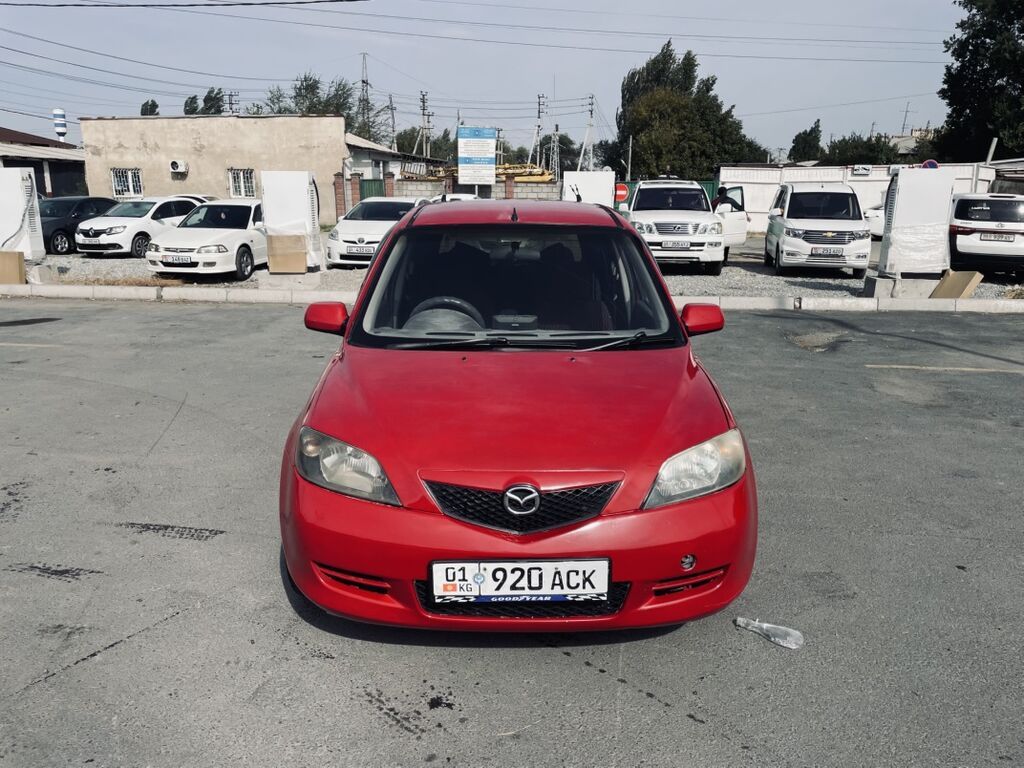 Mazda Demio: 2003 г., 1.5 л, Автомат, Газ, Хэтчбэк: фото 6