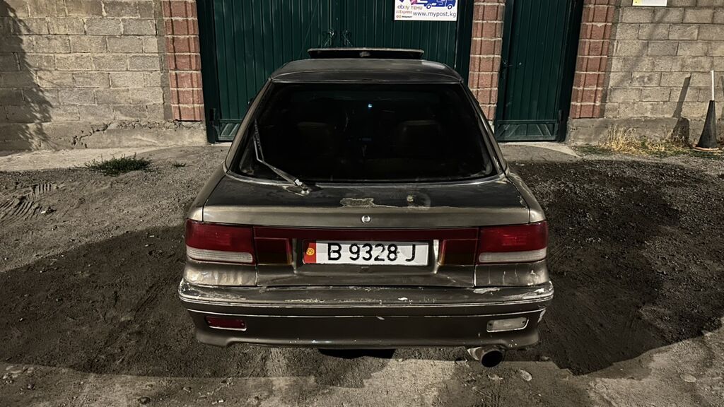 Mitsubishi Lancer: 1991 г., 1.5 л, Механика, Бензин: фото 7