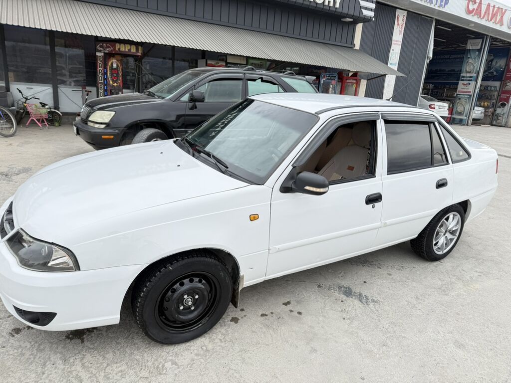 Daewoo Nexia: 2012 г., 1.5 л, Механика, Газ, Седан: фото 2