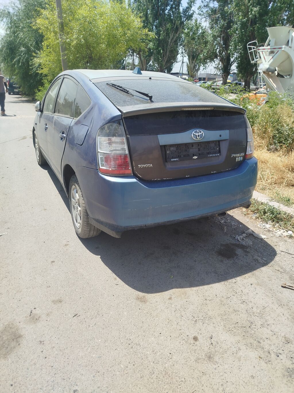 Toyota Prius (XW20), гибридный хэтчбек 5 дв. Основные характеристики: фото 4