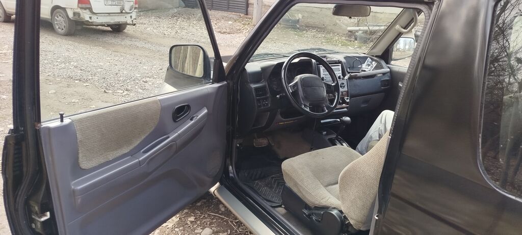 Mitsubishi Pajero Junior: 1996 г., 1.1 л, Автомат, Бензин, Внедорожник: фото 5