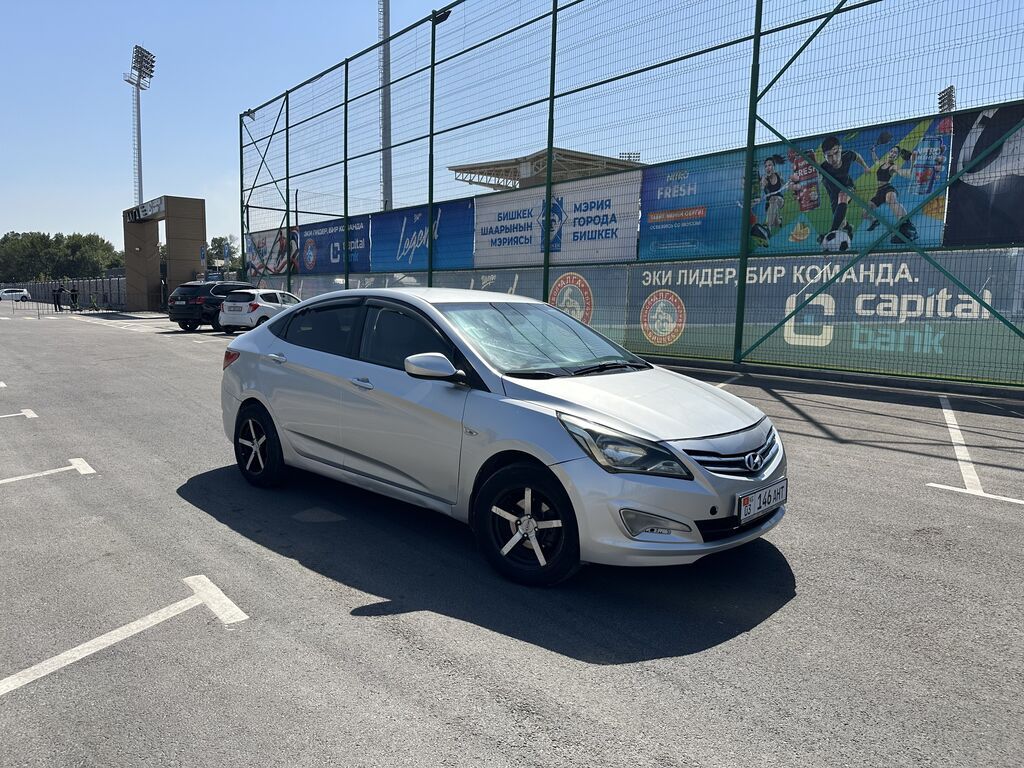 Hyundai Solaris: 2014 г., 1.4 л, Автомат, Бензин, Седан: фото 2