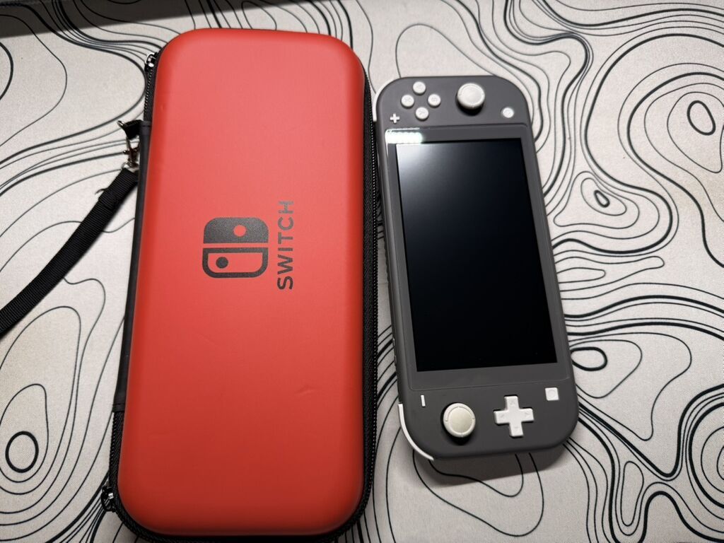 Nintendo Switch Lite (серый) + чехол - Портативная консоль Nintendo: фото 1