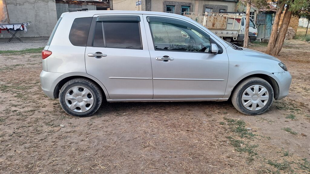 Mazda Demio: 2003 г., 1.3 л, Автомат, Бензин, Хэтчбэк: фото 5