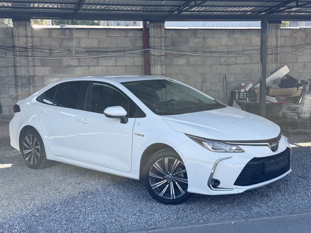 Toyota Corolla: 2020 г., 1.8 л, Вариатор, Гибрид, Седан: фото 2
