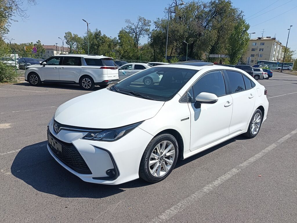 Toyota Corolla: 2023 г., 1.8 л, Вариатор, Гибрид, Седан: фото 7