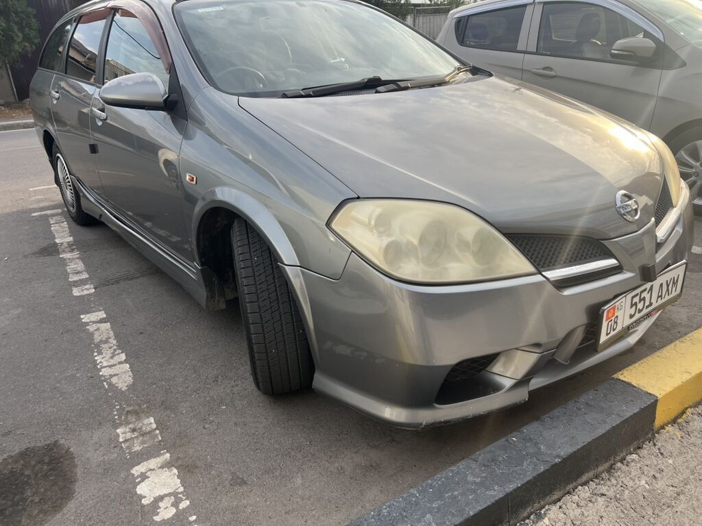 Nissan Primera: 2004 г., 2 л, Автомат, Бензин, Универсал: фото 2