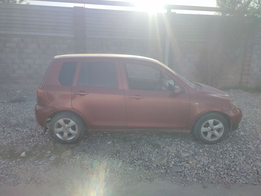 Mazda Demio: 2003 г., Бензин, Хэтчбэк — фото 2
