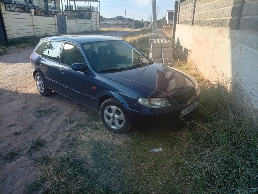 Mazda 323: 2001 г., Универсал: фото 3