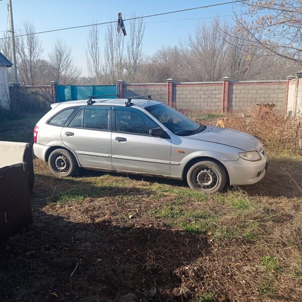 Mazda 323: 2000 г., 1.6 л, Механика, Бензин, Универсал: фото 2