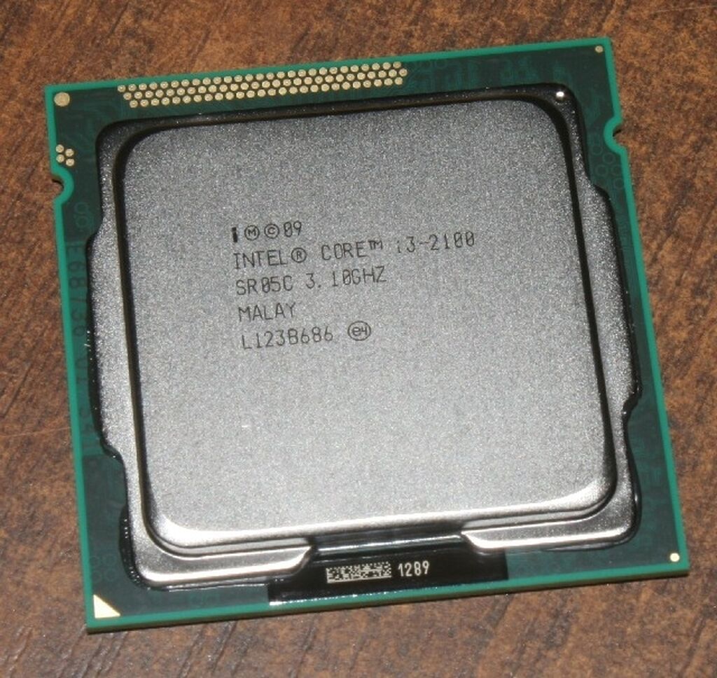 Сокет ай. Процессор Socket 1155 Intel Core i3-2100. Процессор Socket-1155 Intel Core i3-2100, 3,1 ГГЦ. Core i3-2100 lga1155 3.1 ГГЦ/0.5+3мб. Intel Core i3-2100 Sandy Bridge lga1155, 2 x 3100 МГЦ.
