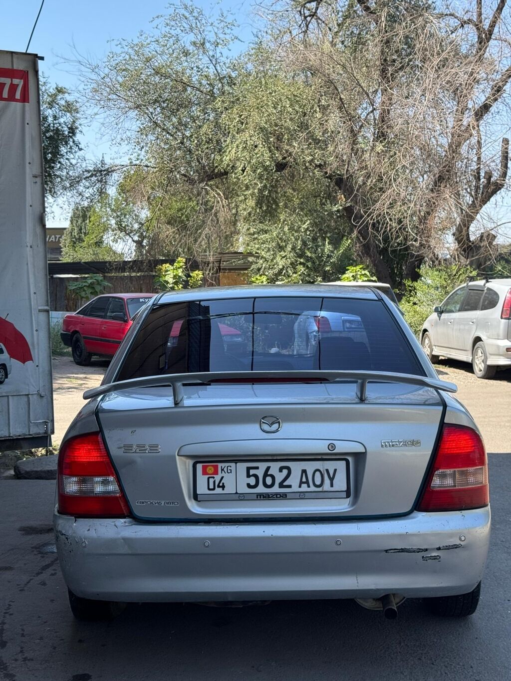 Mazda 323: 2002 г., 1.6 л, Автомат, Бензин, Седан: фото 2