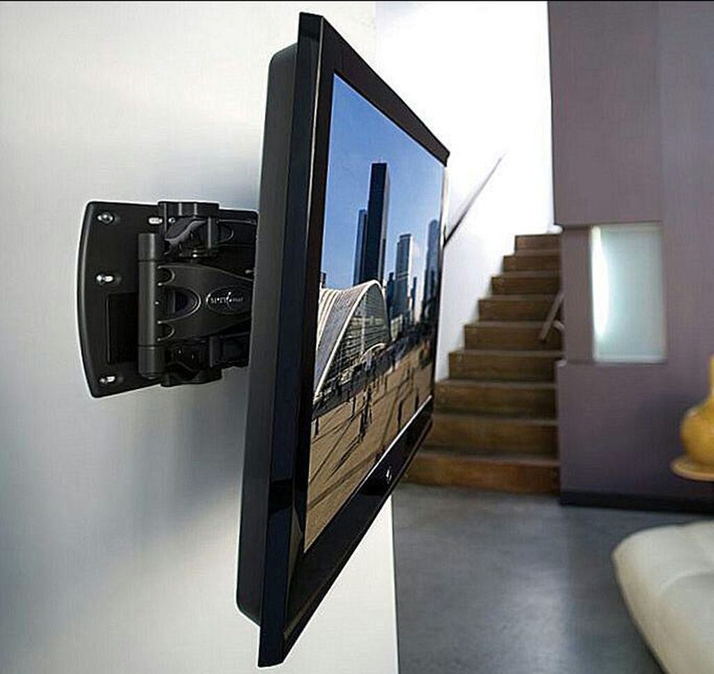 Установить телевизор на компьютер. Установить телевизор на компьютер. Кронштейн nb p4. Розетки под телевизор на стене. Телевизор перед окном.