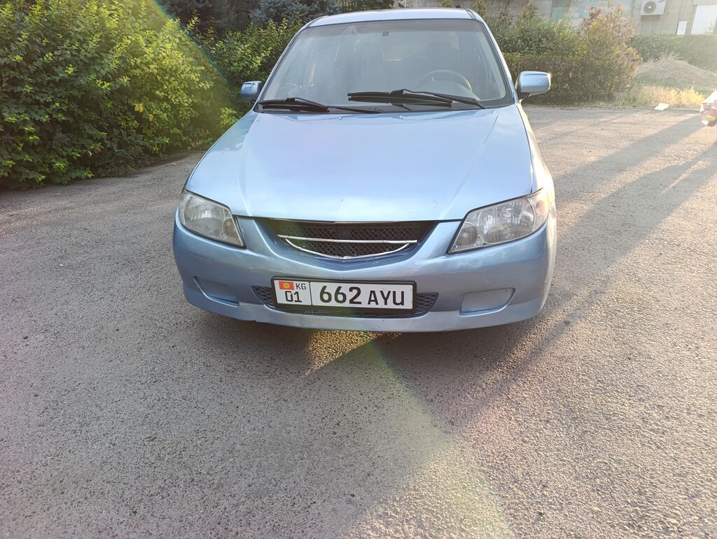 Mazda 323: 2003 г., 1.6 л, Механика, Бензин, Универсал: фото 2