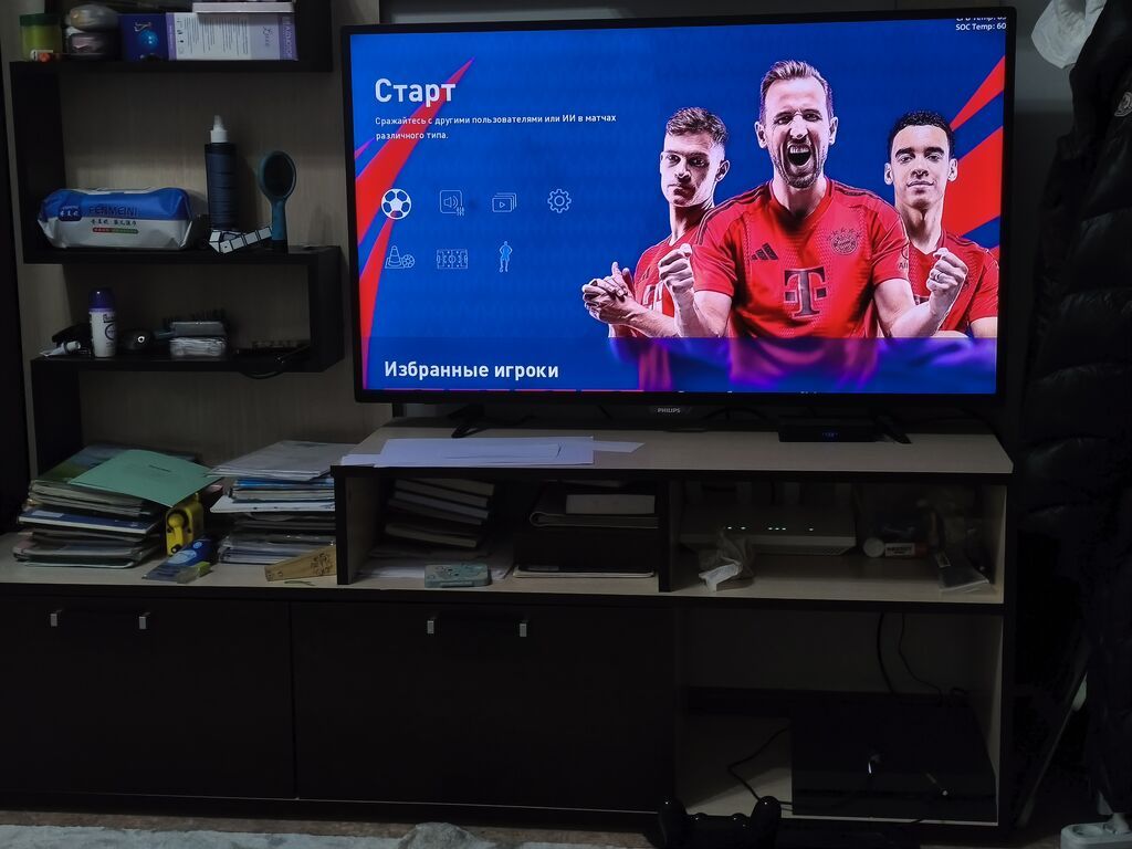 Игровая приставка Sony PlayStation 4 с установленной футбольной игрой: фото 5