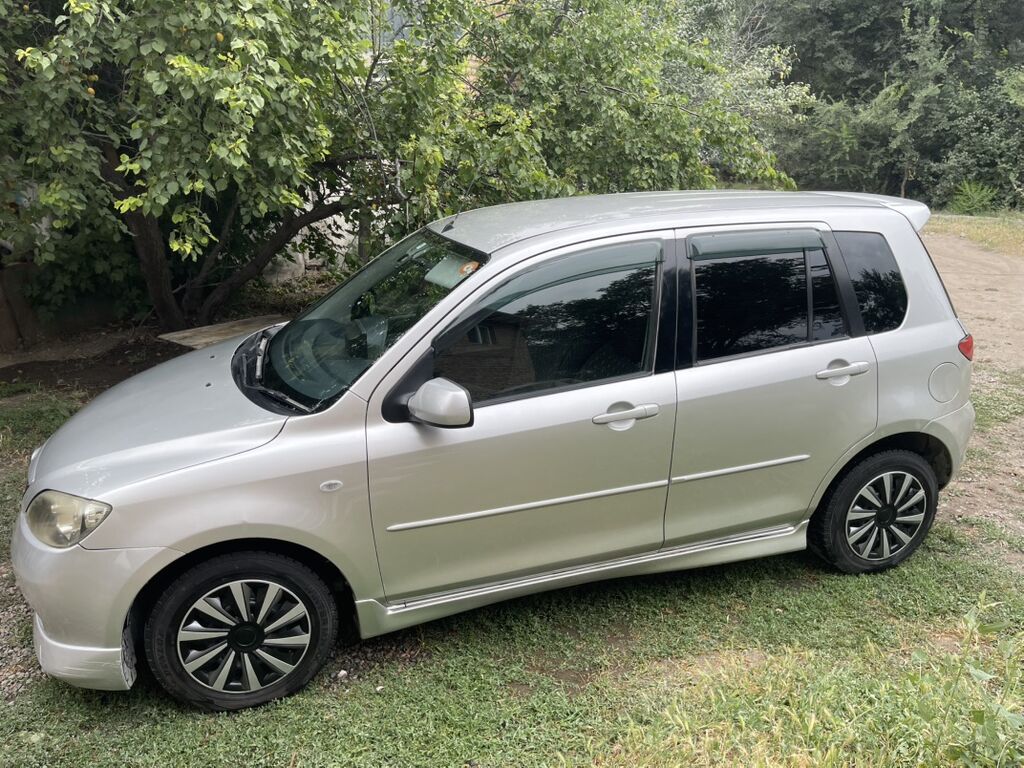 Mazda Demio: 2003 г., Автомат, Бензин, Хэтчбэк — фото 4