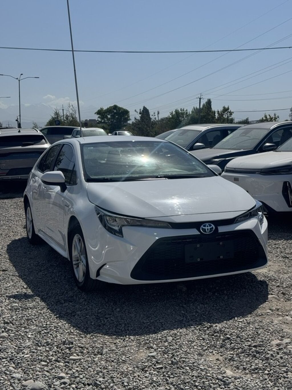 Toyota Corolla: 2023 г., 1.8 л, Вариатор, Гибрид, Седан: фото 3