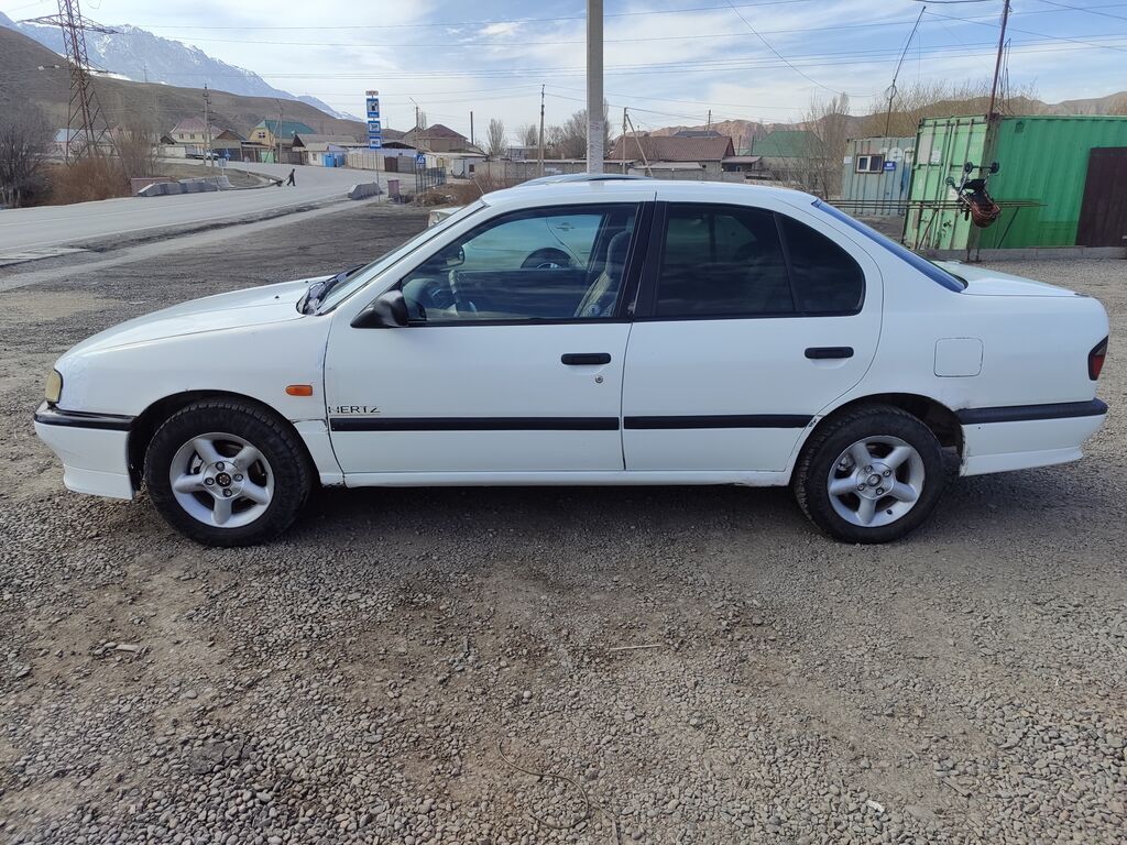 Nissan Primera: 1995 г., 1.6 л, Механика, Бензин, Седан: фото 4