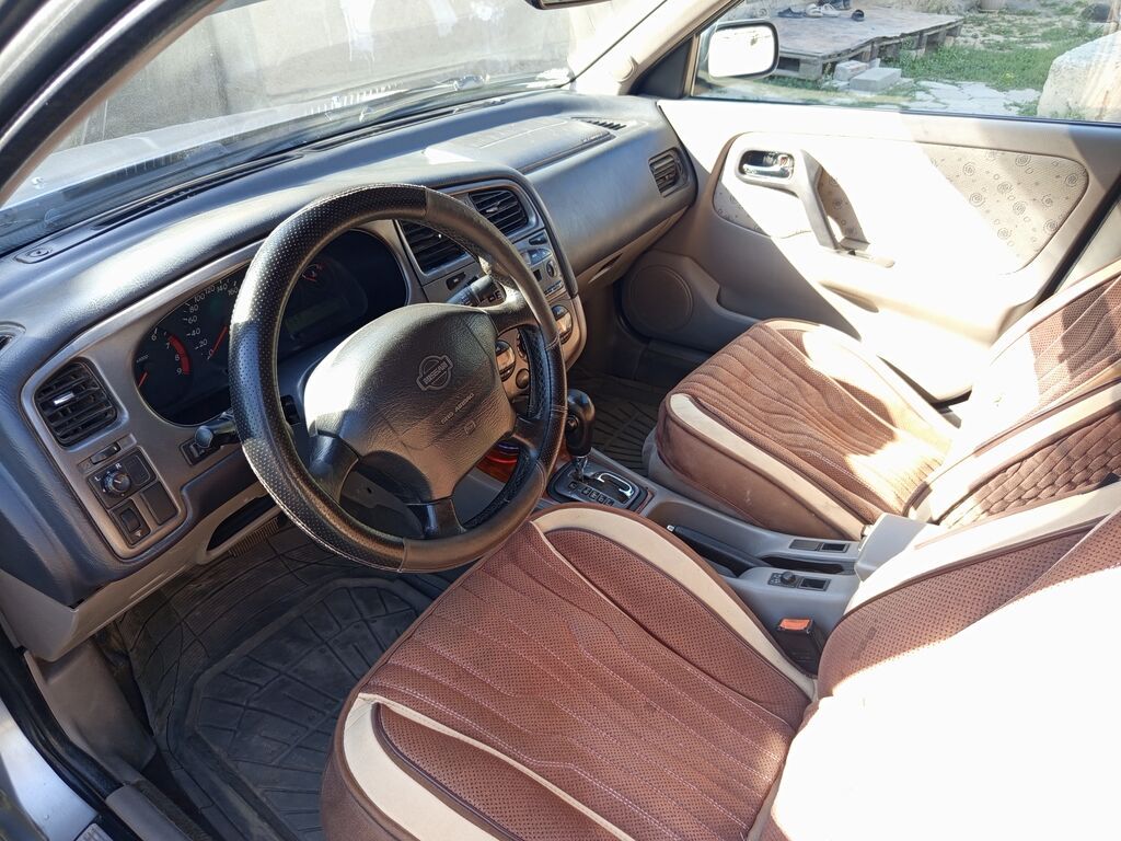 Nissan Primera: 2000 г., 2 л, Механика, Бензин, Седан: фото 6