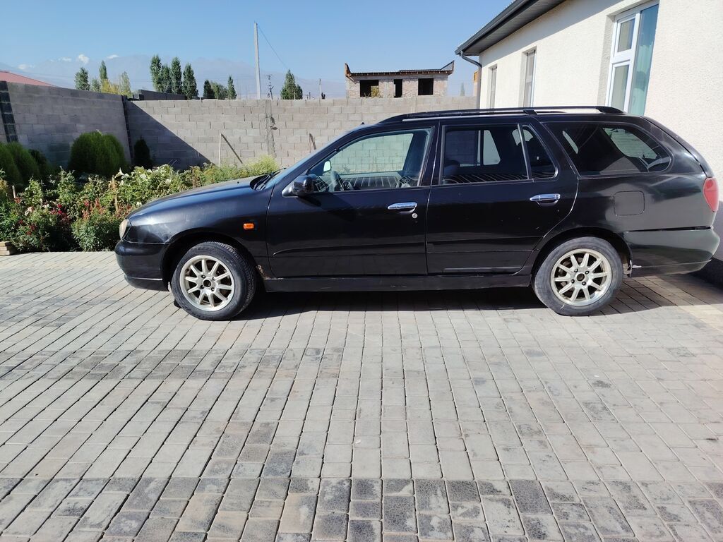 Nissan Primera: 2001 г., 1.8 л, Механика, Бензин, Универсал: фото 4