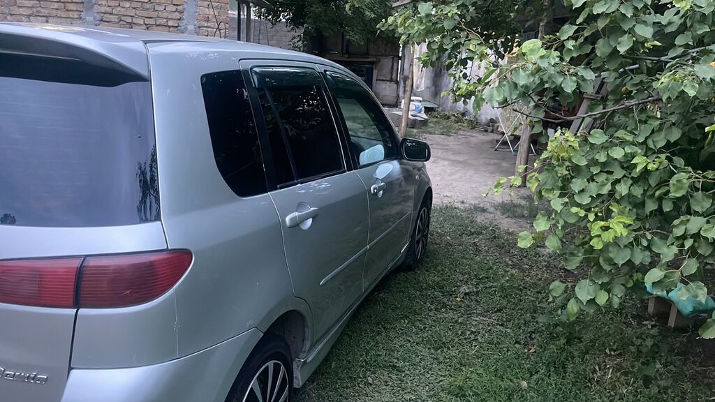 Mazda Demio: 2003 г., Автомат, Бензин, Хэтчбэк — фото 6