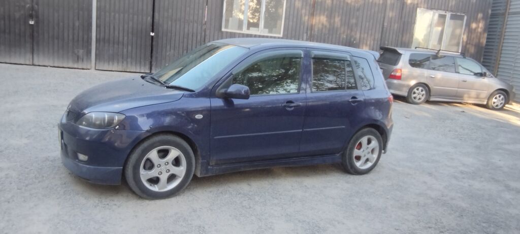Mazda Demio: 2003 г., 1.5 л, Автомат, Бензин, Хэтчбэк: фото 3