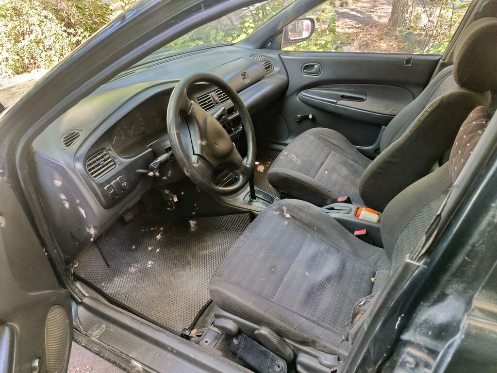 Mazda 323, седан, приблизительно конец 1990‑х – начало 2000‑х годов: фото 5