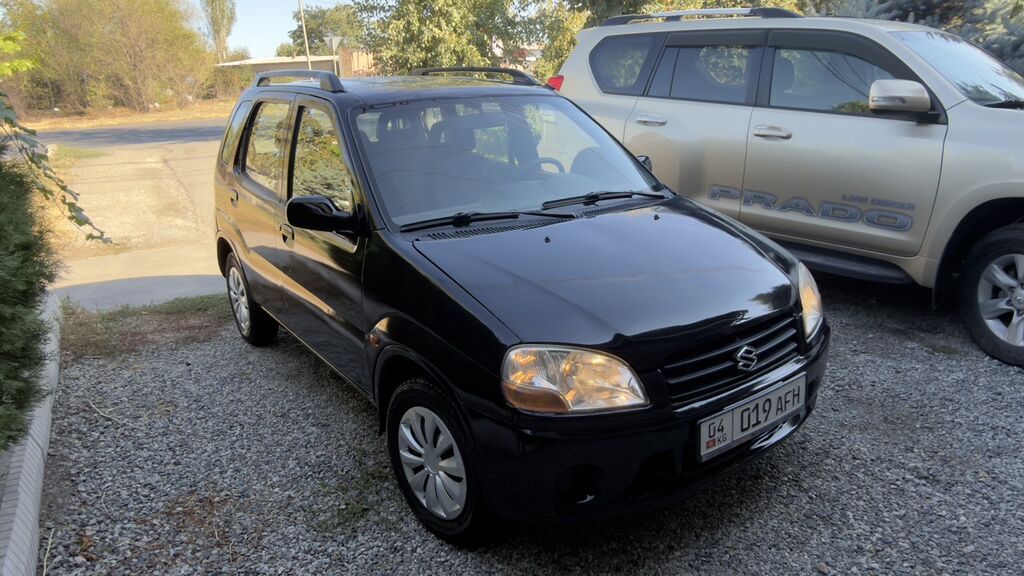 Suzuki Ignis: 2003 г., 1.3 л, Механика, Бензин, Кроссовер: фото 2