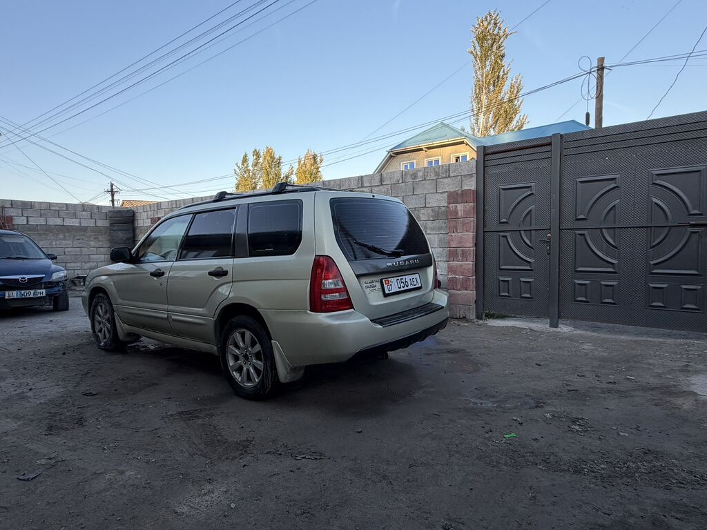 Subaru Forester: 2004 г., 2.5 л, Автомат, Бензин, Универсал: фото 7