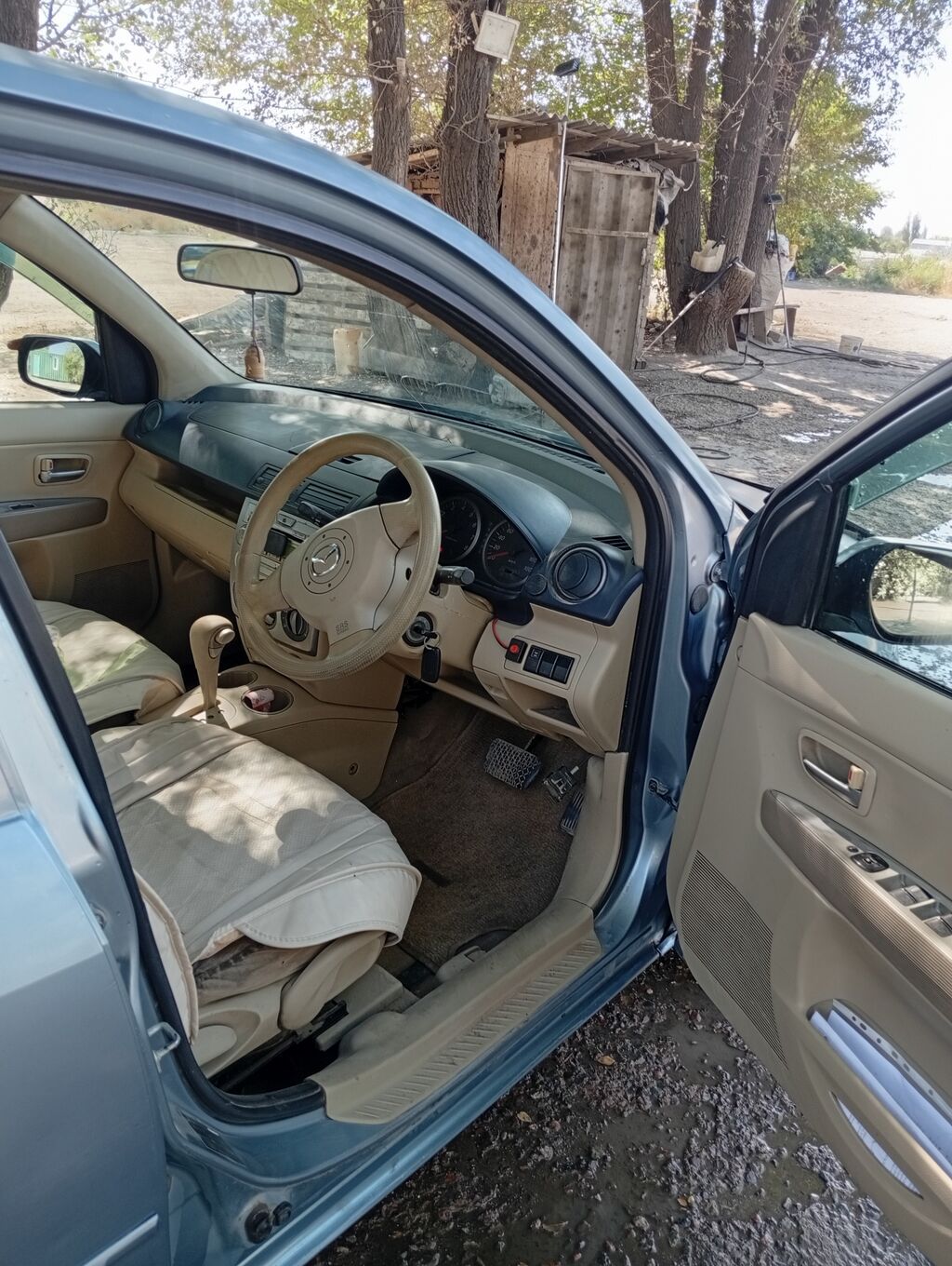 Mazda Demio: 2004 г., 1.3 л, Автомат, Хэтчбэк: фото 5