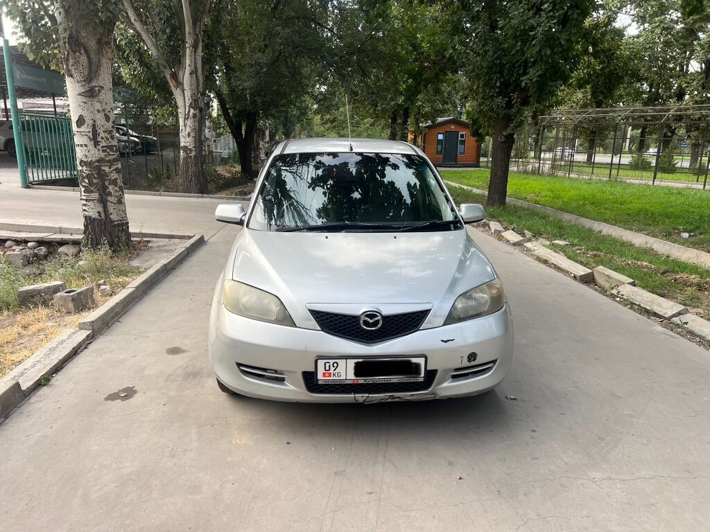 Mazda Demio: 2004 г., 1.3 л, Автомат, Бензин, Хэтчбэк: фото 2