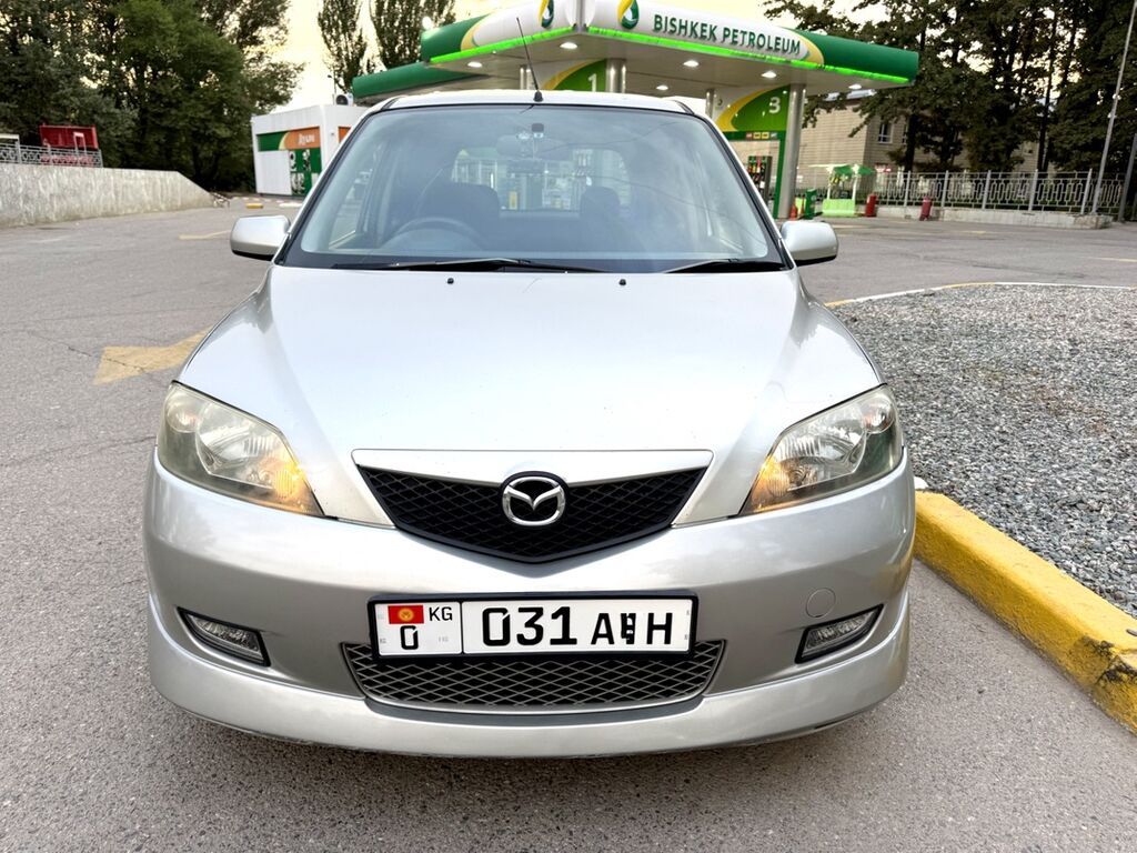 Mazda Demio 2004 г., 1.3 л, автомат: фото 7